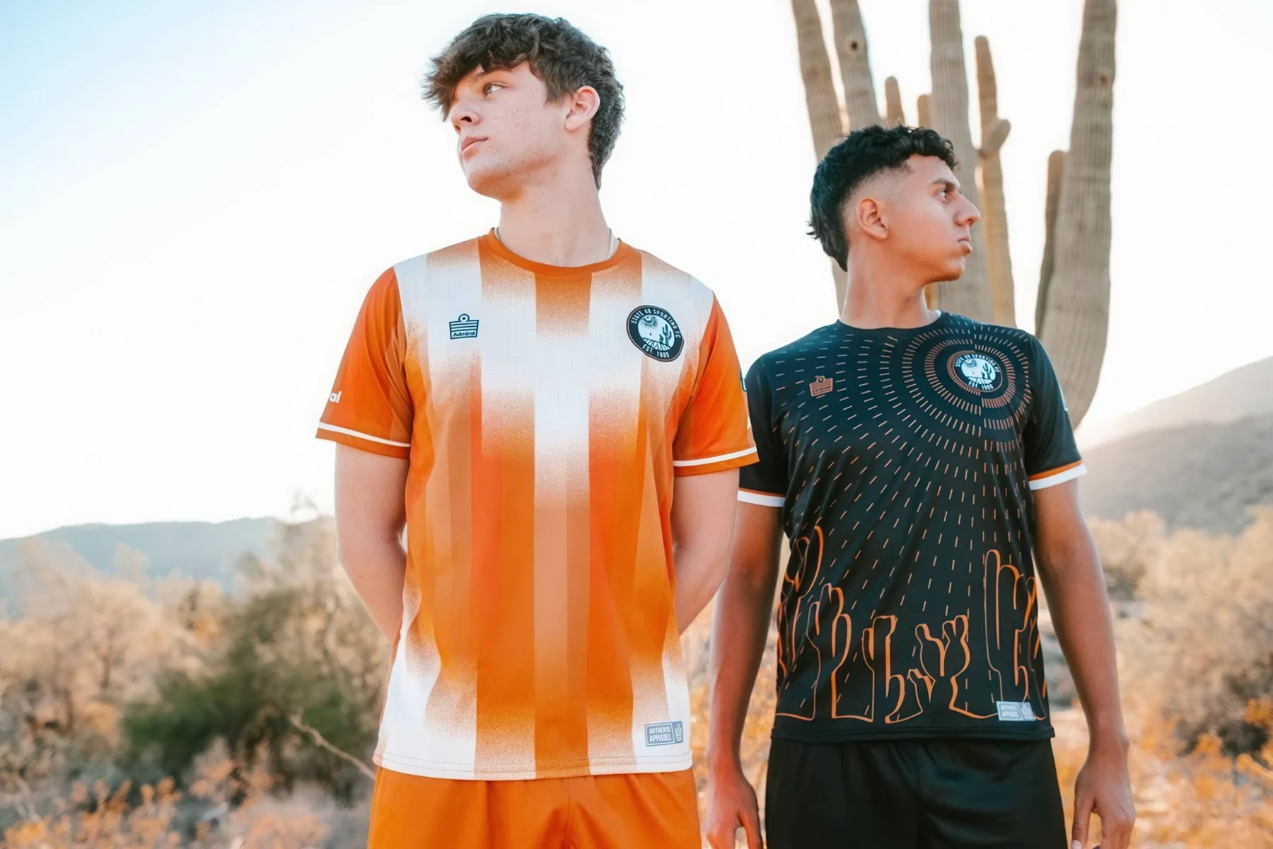 Two State 48 players wearing the copper sunburst and black saguaro kits